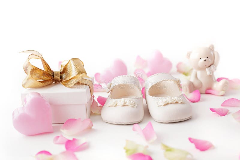 Baby shoes and gift royalty free stock photo