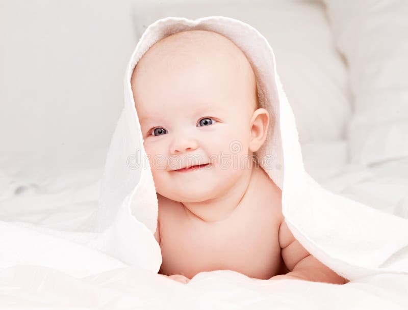 Baby Wrapped into the Towel Stock Photo Image of laugh, joyful 10110650