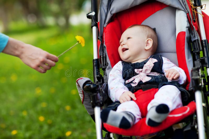 Baby in sitting stroller