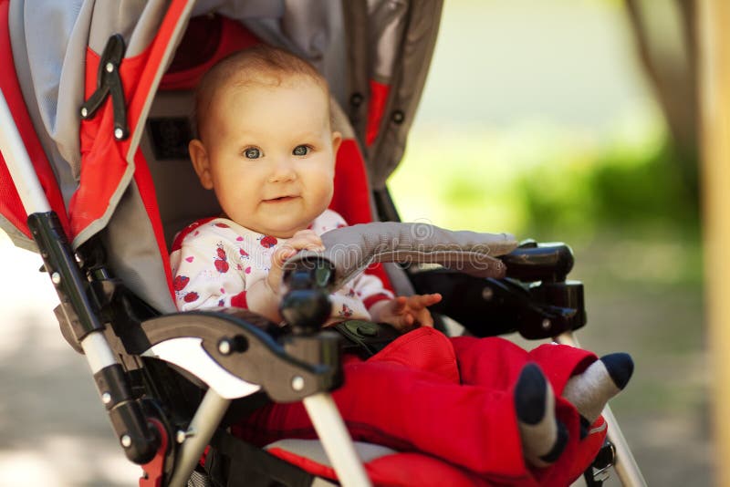 Baby in sitting stroller