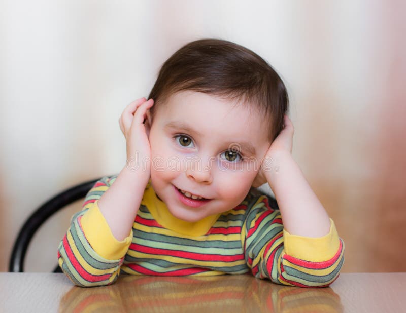 Baby sitting at a table stock photo. Image of human, glass 30508414