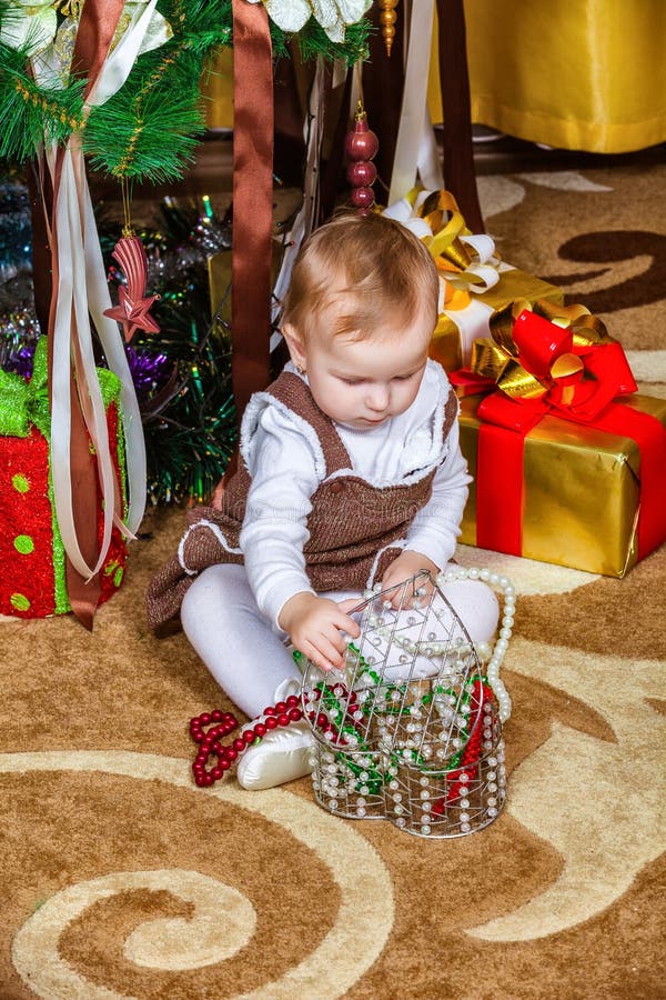 Baby Girl Sitting Under Christmas Tree in Room Stock Photo Image of