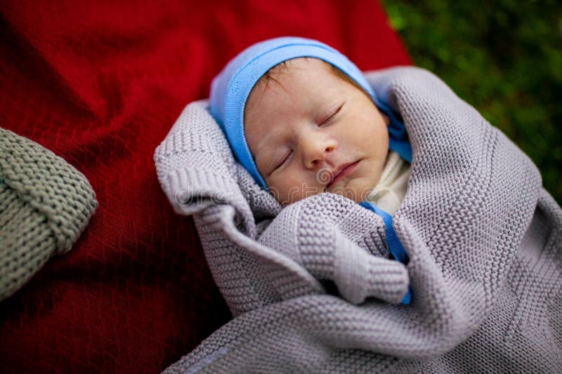 Baby Newborn Sleep , New Born Child Sleeping on grey Blanket, Asleep Infant Kid royalty free stock photo Baby Newborn Sleep , New Born Child Sleeping on grey Blanket, Asleep Infant Kid royalty free stock photo
