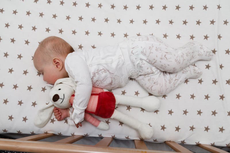 Baby is Sleeping in the Bed with Rabbit Toy Stock Photo Image of baby