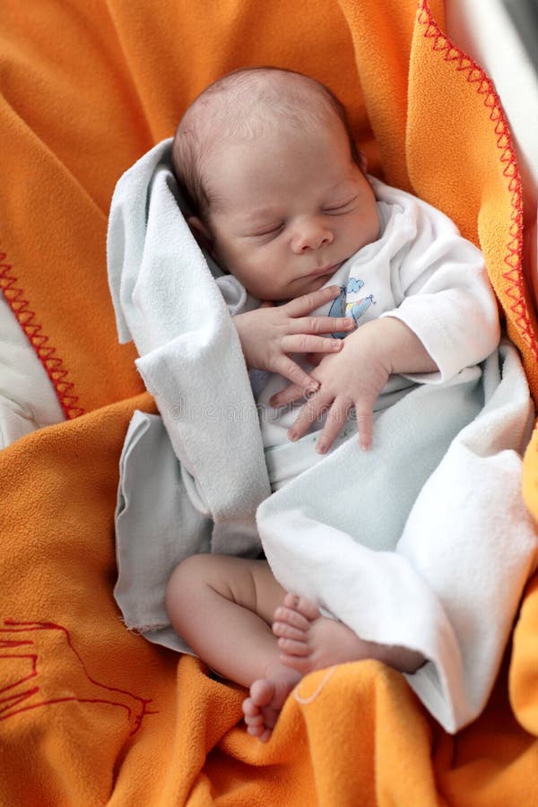 Baby sleeping in the chair stock image. Image of childhood 59256697