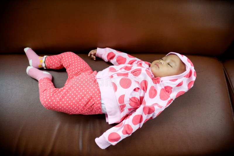 Baby Sleeping On A Sofa Picture. Image 8275633