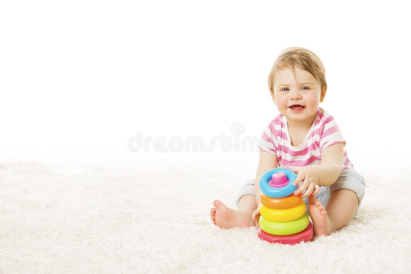 Baby-Spiel Toy Rings Pyramid, Säuglingskind, das Bausteine spielt lizenzfreie stockfotografie Baby-Spiel Toy Rings Pyramid, Säuglingskind, das Bausteine spielt lizenzfreie stockfotografie