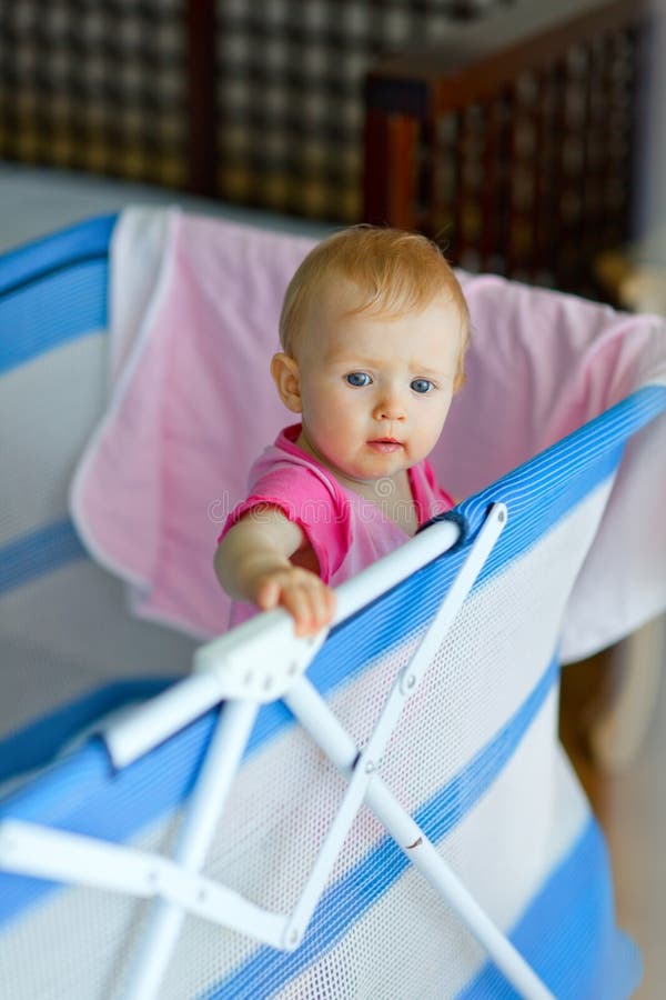 Mom Smiling at Baby Over Playpen Railing Stock Photo Image of looking