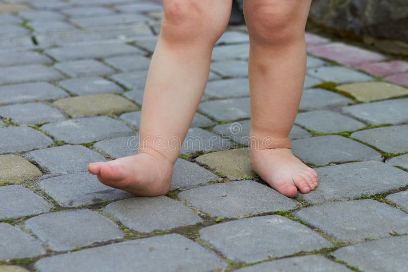 Baby Barefoot Child Wears Shoes Stock Image Image of wear, sitting