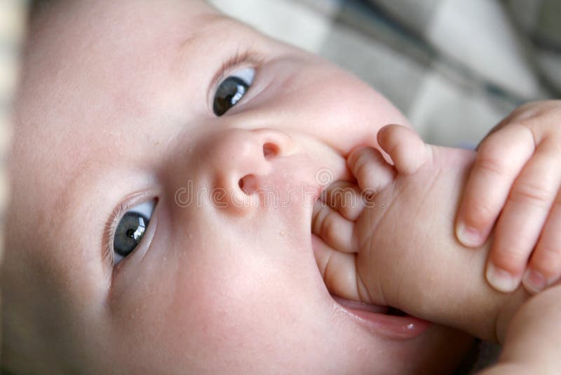 Baby Sucking on Toes