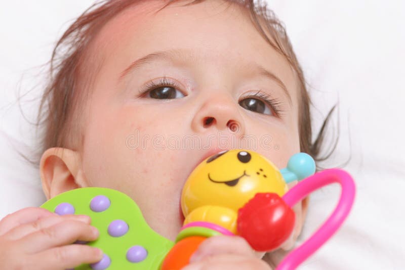 Baby with toy stock photo. Image of baby, face, childhood 7414438