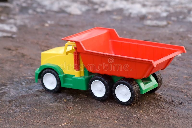 Baby Toy Dump Truck In Mud Picture. Image 4903963