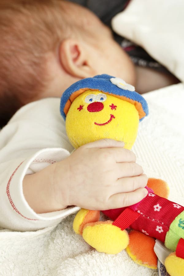 Baby with a toy stock image. Image of parent, caress 41697521