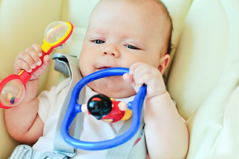 Baby with toys royalty free stock photo