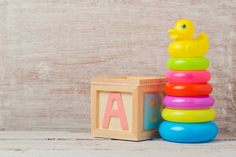 Baby toys on wooden table. Child development royalty free stock photos Baby toys on wooden table. Child development royalty free stock photos