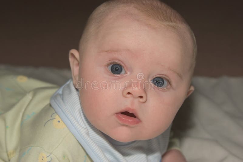 Baby wakes up stock image. Image of pastel, curiosity, alert 705623