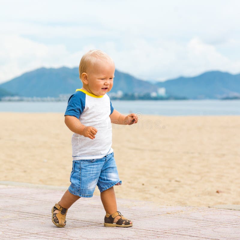 Baby walking stock photo. Image of child, learning, face 45506308