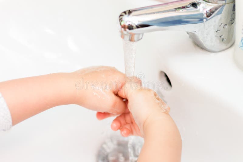 Baby washing hands stock image. Image of baby, child 13404903