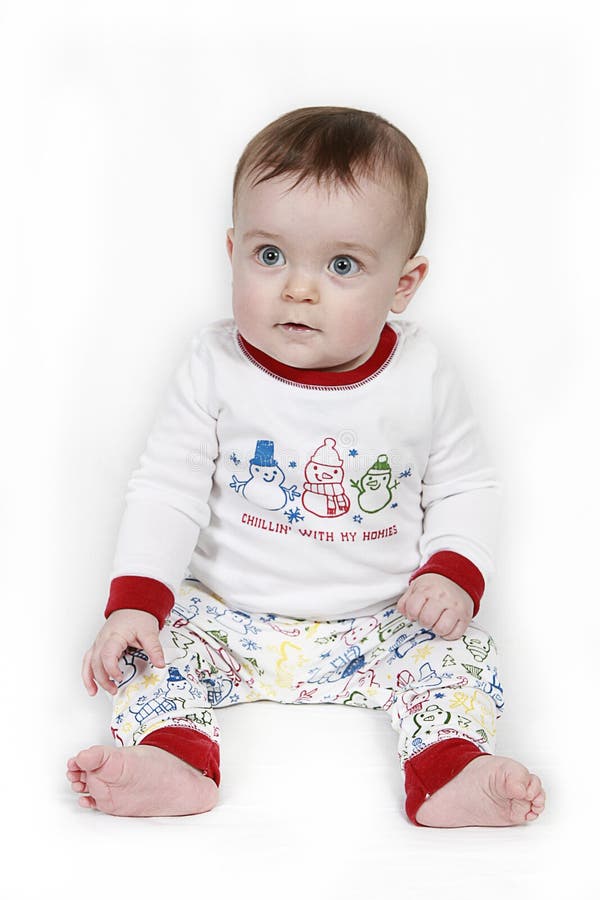 Baby wearing Holiday pajamas