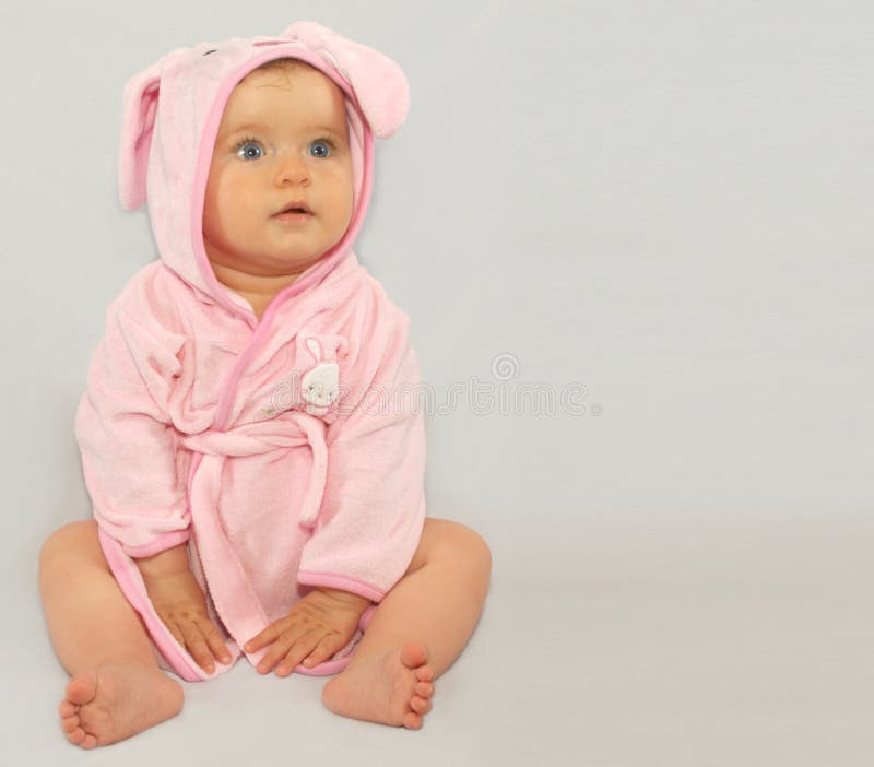 Baby wearing a rabbit bathrobe