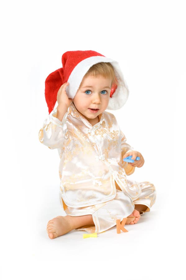 Baby wearing Santa Claus hat