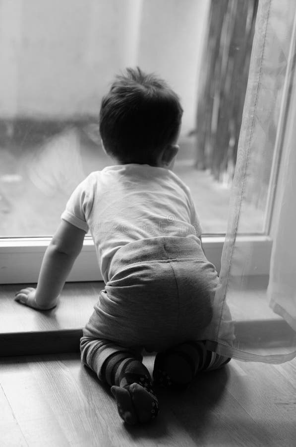 Baby by window stock image. Image of window, child, looking 54316357
