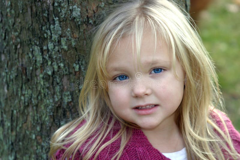 Beautiful blonde little girl with big blue eyes. Beautiful blonde little girl with big blue eyes