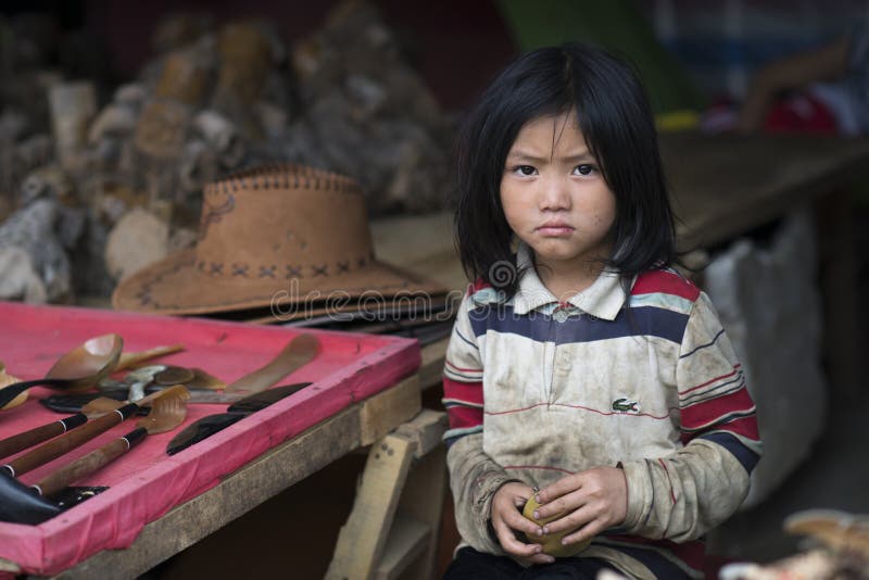 Portrait of a beautiful vietnamese girl from a little rural village in Sapa with unhappy expression. Lao Cai, Vietnam. royalty free stock photo Portrait of a beautiful vietnamese girl from a little rural village in Sapa with unhappy expression. Lao Cai, Vietnam. royalty free stock photo