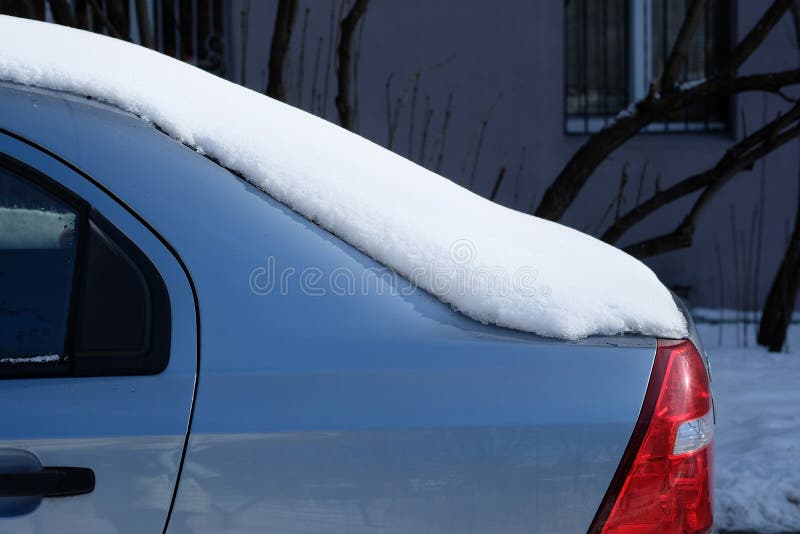 Snow on the Roof and Back of the Car. Stock Photo Image of back