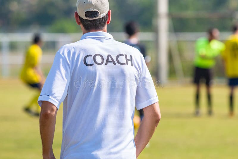 Back of Sport Coach Wearing COACH Shirt at an Outdoor Sport Field ...