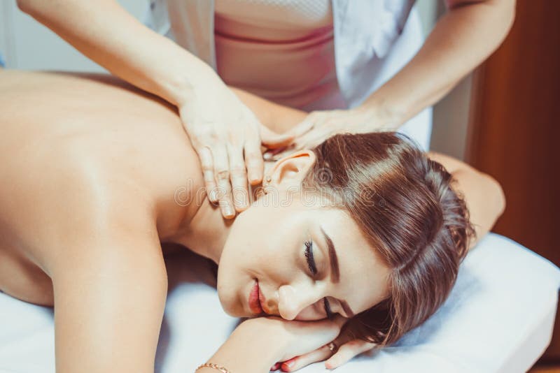 A Back Massage In The Salon Stock Image Image Of Closeup Masseuse