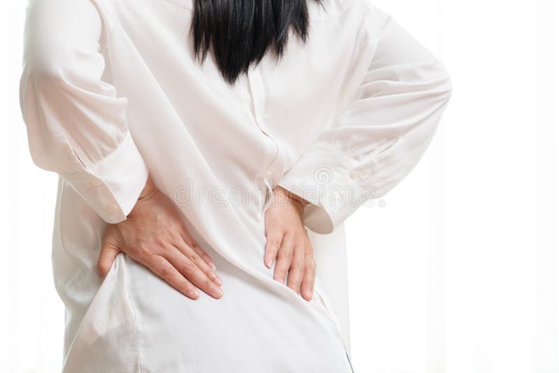 Back pain at home. women suffer from backache. healthcare and medical concept royalty free stock photo Back pain at home. women suffer from backache. healthcare and medical concept royalty free stock photo