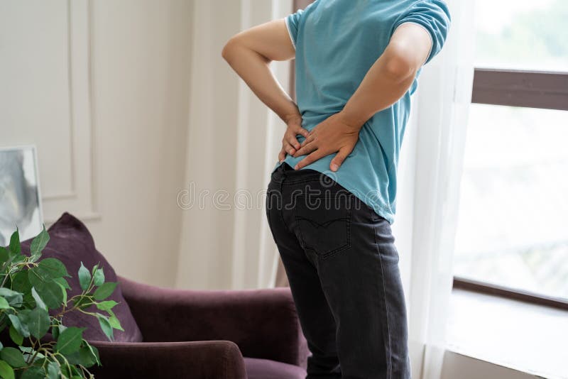 Back Pain Kidney Inflammation Man Suffering From Backache At Home