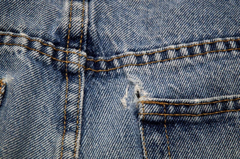 Back pocket of jeans with hole