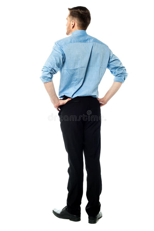 Rear view of a man standing with arms... | Man standing, Standing poses,  Figure poses