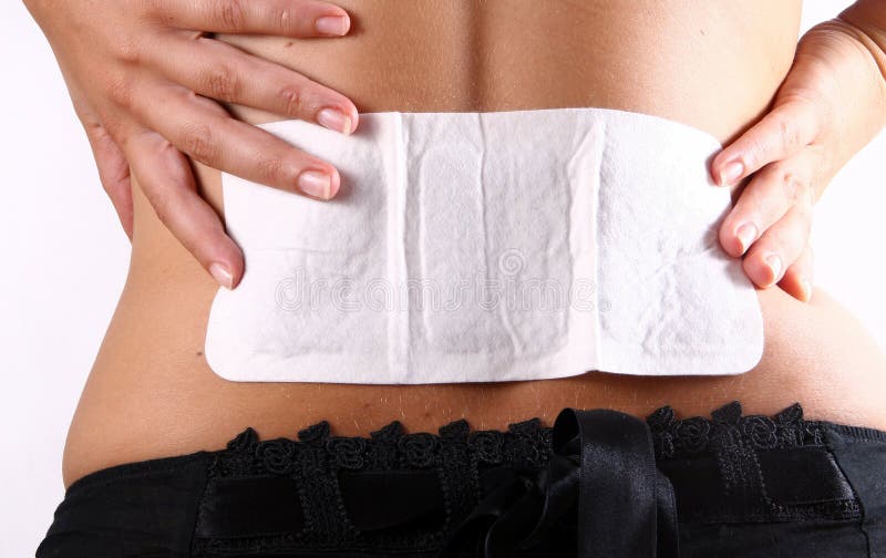 A woman holding her back in pain!. Spasm ache stock images, royalty-free photos and pictures