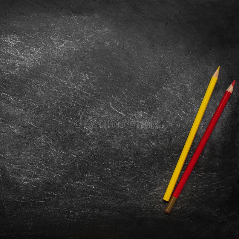 Back to school Background. Black chalkboard with colorful pencils. Flat lay. Copy space