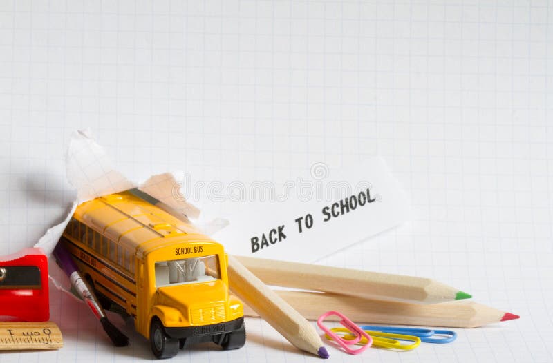 Back to school background concept with bus and accessories stock photo Back to school background concept with bus and accessories stock photo