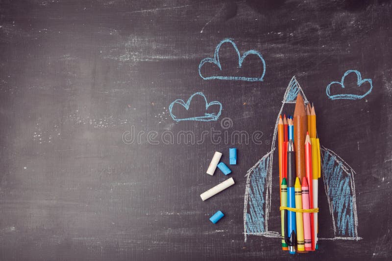 Back to school background with rocket made from pencils. royalty free stock photography