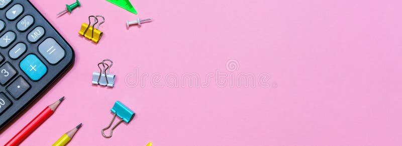 Back to school concept. School and office supplies on a pink background. stock images