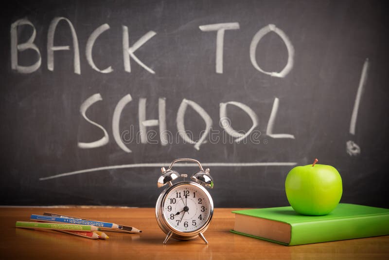 Back To School Theme Using School Supplies and Blackboard Stock Image