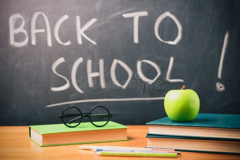 Back To School Theme Using School Supplies and Blackboard Stock Image