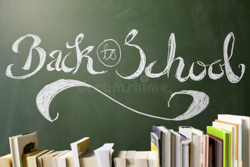 Back To School Written on Chalkboard, Books in Foreground Stock Photo Image of teaching
