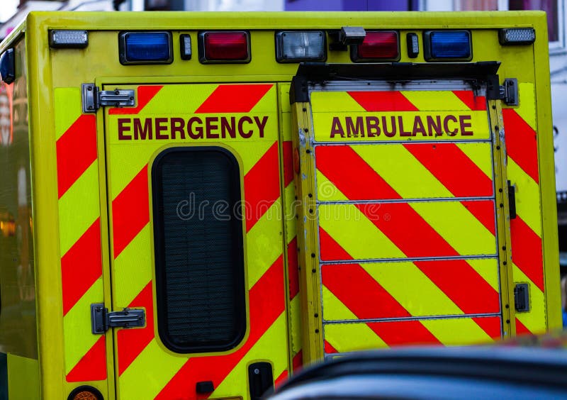 Back View of Ambulance Car in the Traffic. Urgent Help and Health