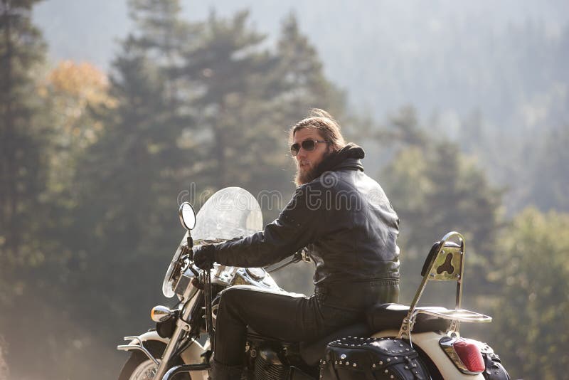 Bearded Biker with Long Hair in Black Leather Jacket Sitting on Modern Motorcycle. Stock Image - Image of adventure, lifestyle: 135995953 Bearded Biker with Long Hair in Black Leather Jacket Sitting on Modern Motorcycle. Stock Image - Image of adventure, lifestyle: 135995953