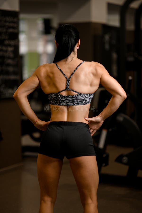 Back View of Healthy Strong Woman in Sportswear Standing in Gym Stock Photo  - Image of adult, bodybuilding: 206743212