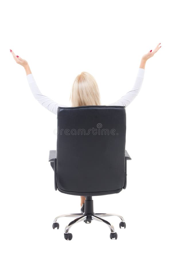 back view of business woman sitting in office chair and celebrating success isolated on white