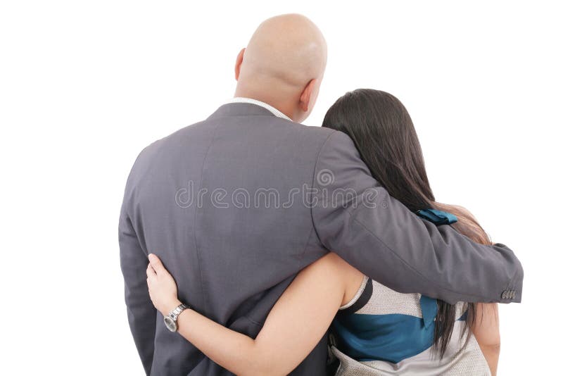 Back view of couple hug