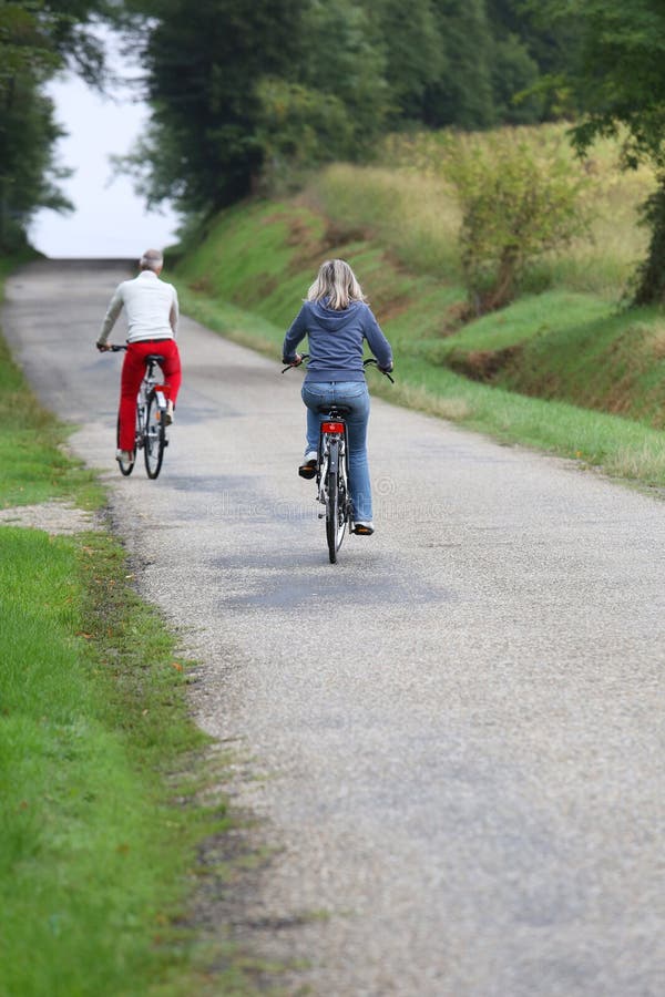 Back View of Couple Riding Bicycle Stock Image Image of active