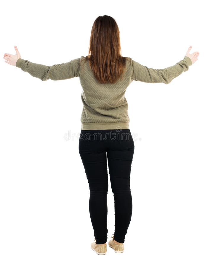 Back view of dancing young beautiful woman.